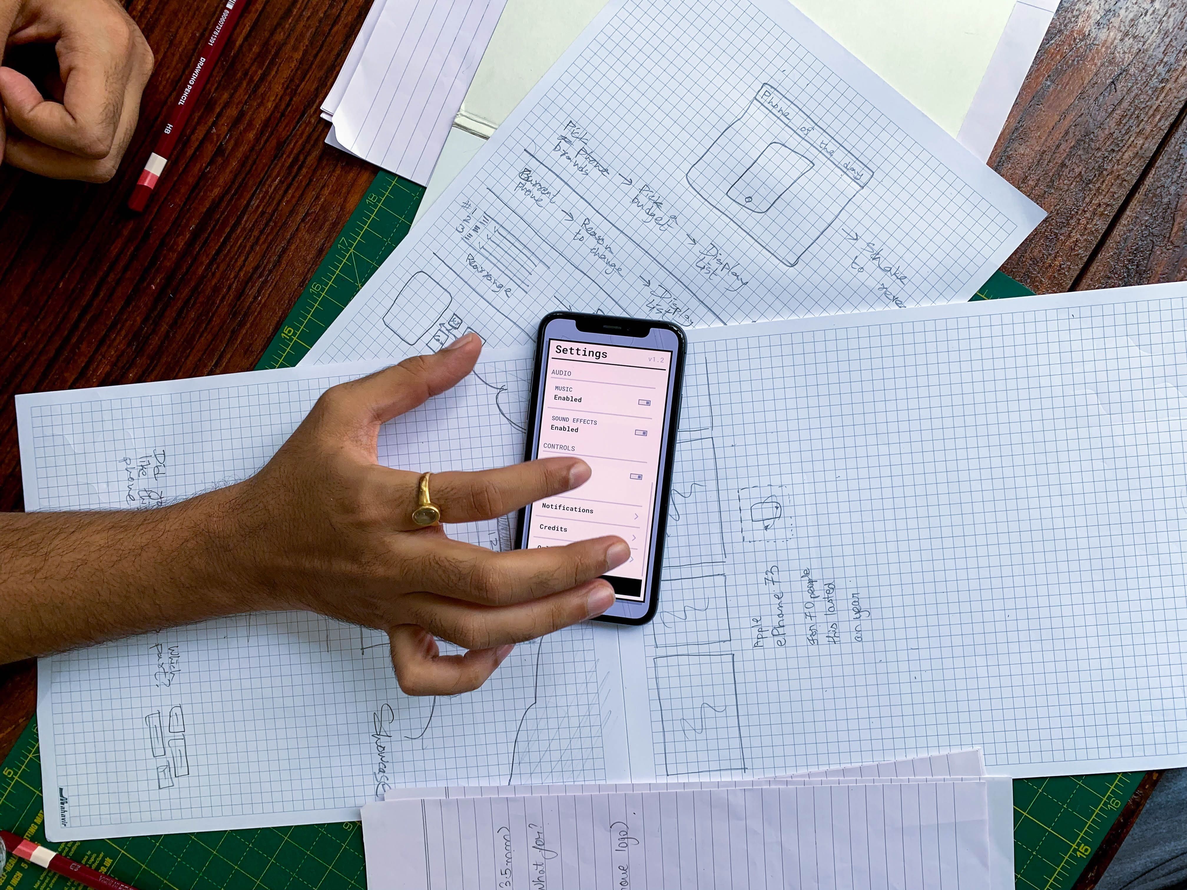 Mobile app UI design and development on iPhone mockup